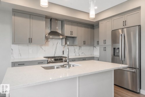 7122 52 Ave Beaumont, Beaumont, AB - Indoor Photo Showing Kitchen With Double Sink With Upgraded Kitchen