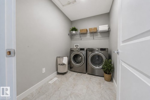 7122 52 Ave Beaumont, Beaumont, AB - Indoor Photo Showing Laundry Room