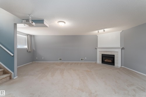 2216 134 Avenue Nw, Edmonton, AB - Indoor With Fireplace