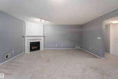2216 134 Avenue Nw, Edmonton, AB - Indoor With Fireplace