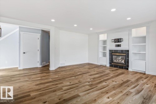 661 Bevington Place Nw, Edmonton, AB - Indoor With Fireplace