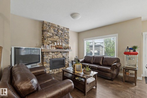 8005 223 Street Nw, Edmonton, AB - Indoor Photo Showing Living Room With Fireplace