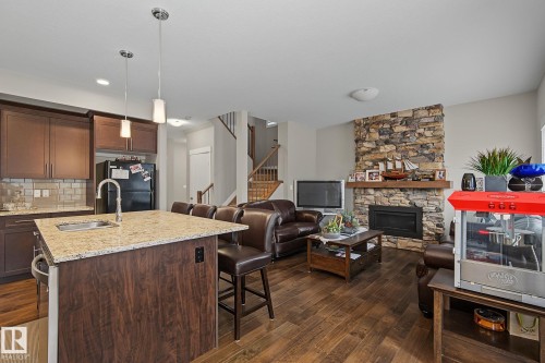 8005 223 Street Nw, Edmonton, AB - Indoor Photo Showing Kitchen With Fireplace