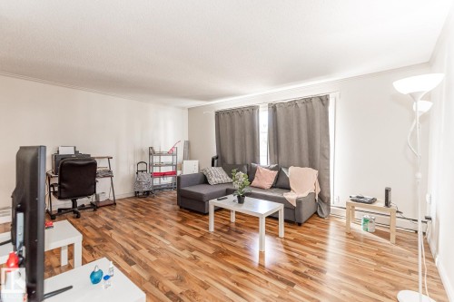 #204 10633 81 Av Nw, Edmonton, AB - Indoor Photo Showing Living Room