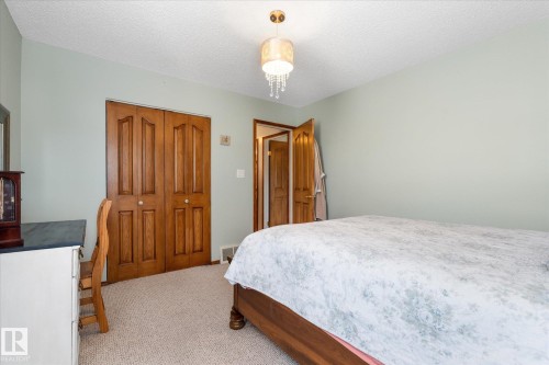76 Chungo Crescent, Devon, AB - Indoor Photo Showing Bedroom