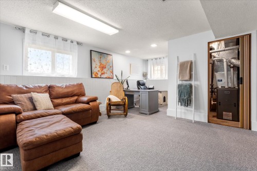 76 Chungo Crescent, Devon, AB - Indoor Photo Showing Living Room