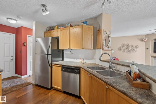 #2 20 Norman Ct, St. Albert, AB - Indoor Photo Showing Kitchen With Stainless Steel Kitchen With Double Sink