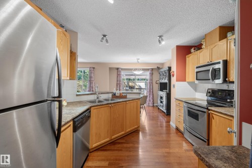 #2 20 Norman Ct, St. Albert, AB - Indoor Photo Showing Kitchen With Stainless Steel Kitchen With Double Sink