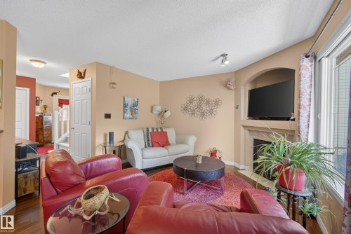 #2 20 Norman Ct, St. Albert, AB - Indoor Photo Showing Living Room With Fireplace