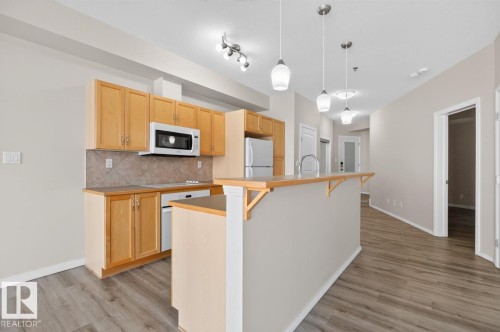Kitchen - #100 4835 104A St Nw, Edmonton, AB 
