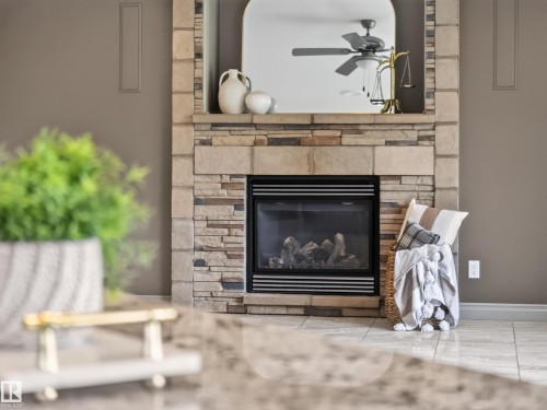 6502 37 Avenue, Beaumont, AB - Indoor Photo Showing Living Room With Fireplace