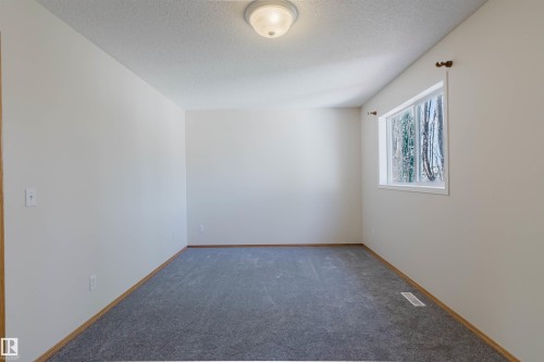 Empty room - 1686 Tompkins Wynd Nw, Edmonton, AB - Indoor Photo Showing Other Room