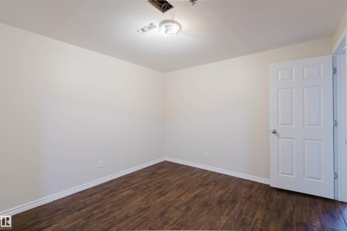 Empty room - 1686 Tompkins Wynd Nw, Edmonton, AB - Indoor Photo Showing Other Room