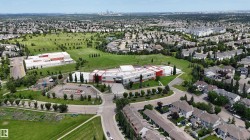 Expansive neighborhood featuring numerous residential properties and abundant green spaces - 
