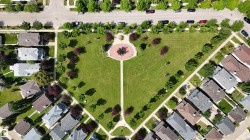 Aerial perspective highlighting a central green space - 