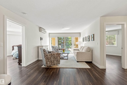 #203 8956 156 St Nw, Edmonton, AB - Indoor Photo Showing Living Room