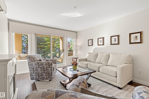 #203 8956 156 St Nw, Edmonton, AB - Indoor Photo Showing Living Room