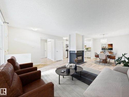 152 Surrey Gardens, Edmonton, AB - Indoor Photo Showing Living Room With Fireplace