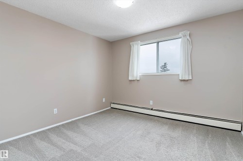 #407 3610 43 Av Nw, Edmonton, AB - Indoor Photo Showing Other Room