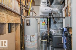 Water heater, furnace system, and humidifier installation - 