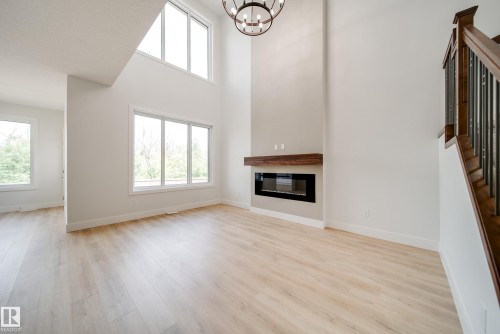 8816 183 Avenue Nw, Edmonton, AB - Indoor Photo Showing Other Room With Fireplace