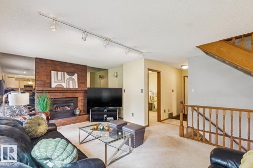 15804 80 Street Nw, Edmonton, AB - Indoor Photo Showing Living Room With Fireplace