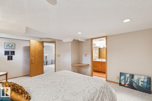 Carpeted room with recessed lighting and a textured ceiling - 15804 80 Street Nw, Edmonton, AB - Indoor Photo Showing Bedroom