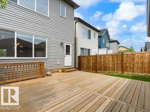 Expansive wood deck with a full-height wood privacy fence - 17487 77 Street, Edmonton, AB - Outdoor With Deck Patio Veranda