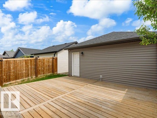 Expansive wood deck with a privacy fence - 17487 77 Street, Edmonton, AB - Outdoor With Exterior