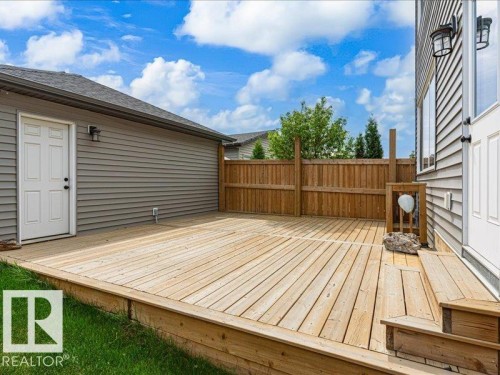 Spacious wood deck with perimeter wood railing, offering a private outdoor area - 17487 77 Street, Edmonton, AB - Outdoor With Deck Patio Veranda With Exterior