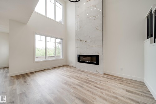8740 183 Avenue Nw, Edmonton, AB - Indoor Photo Showing Living Room With Fireplace