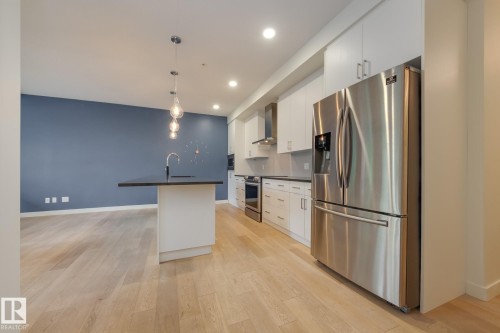 #102 10606 84 Av Nw, Edmonton, AB - Indoor Photo Showing Kitchen With Stainless Steel Kitchen With Upgraded Kitchen