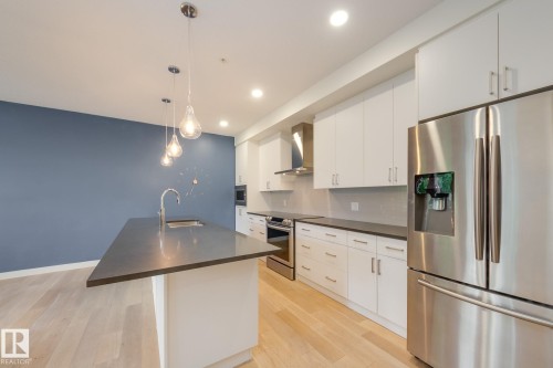 #102 10606 84 Av Nw, Edmonton, AB - Indoor Photo Showing Kitchen With Stainless Steel Kitchen With Upgraded Kitchen