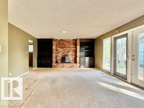 111 Green Ash Drive, Wetaskiwin, AB - Indoor With Fireplace