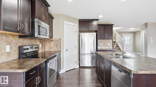 17211 78 Street Nw, Edmonton, AB - Indoor Photo Showing Kitchen With Double Sink With Upgraded Kitchen