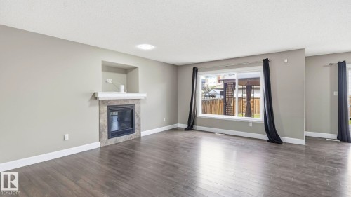 17211 78 Street Nw, Edmonton, AB - Indoor Photo Showing Living Room With Fireplace