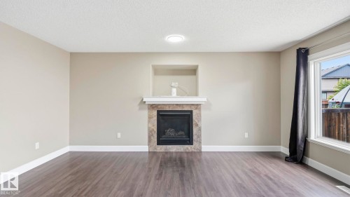 17211 78 Street Nw, Edmonton, AB - Indoor Photo Showing Living Room With Fireplace