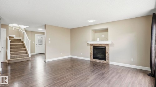17211 78 Street Nw, Edmonton, AB - Indoor Photo Showing Living Room With Fireplace