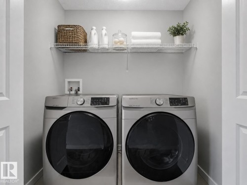 908 Goshawk Point(E) Nw, Edmonton, AB - Indoor Photo Showing Laundry Room