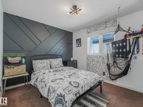 908 Goshawk Point(E) Nw, Edmonton, AB - Indoor Photo Showing Bedroom