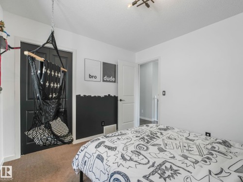 908 Goshawk Point(E) Nw, Edmonton, AB - Indoor Photo Showing Bedroom