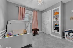 Room featuring soft gray carpeting and gray wall paint - 