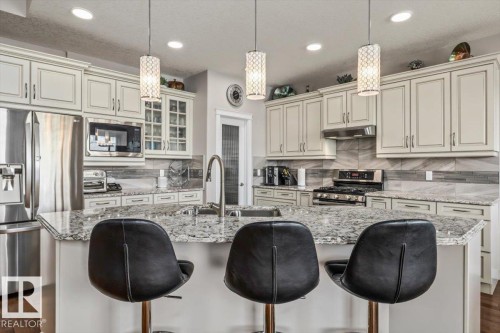87 Lakeland Crescent, Beaumont, AB - Indoor Photo Showing Kitchen With Upgraded Kitchen