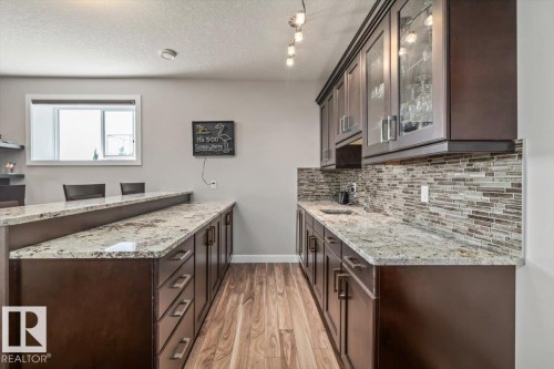87 Lakeland Crescent, Beaumont, AB - Indoor Photo Showing Kitchen With Upgraded Kitchen