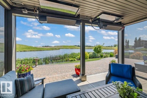 87 Lakeland Crescent, Beaumont, AB - Outdoor With Body Of Water With Deck Patio Veranda With Exterior