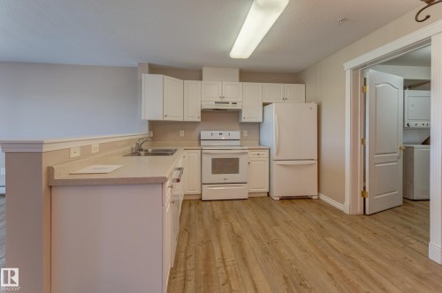 #326 2741 55 St Nw, Edmonton, AB - Indoor Photo Showing Kitchen With Double Sink