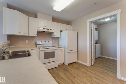 #326 2741 55 St Nw, Edmonton, AB - Indoor Photo Showing Kitchen With Double Sink