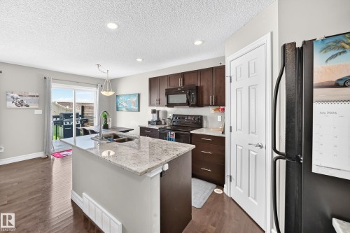 15908 10 Avenue Sw, Edmonton, AB - Indoor Photo Showing Kitchen With Double Sink