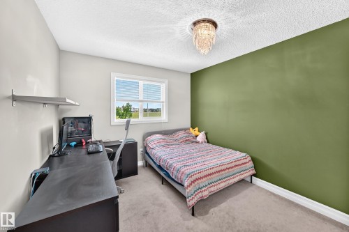 15908 10 Avenue Sw, Edmonton, AB - Indoor Photo Showing Bedroom