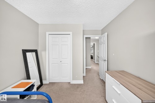 15908 10 Avenue Sw, Edmonton, AB - Indoor Photo Showing Bedroom